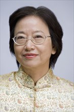 Close up of Asian woman in eyeglasses