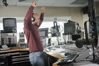 African dj working at radio station