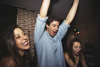 Friends cheering in nightclub