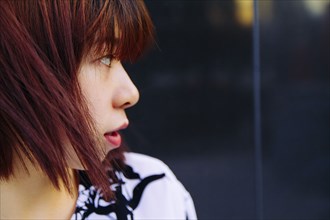 Close up of profile of Chinese woman