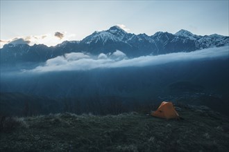 Camping tent in mountain landscape