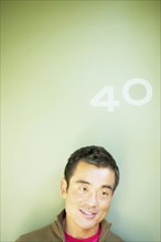 Close up of man with number 40 above his head