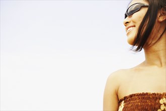 Asian woman wearing sunglasses