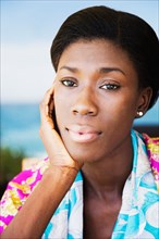 African woman with head in hands