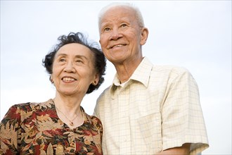 Smiling senior Chinese couple