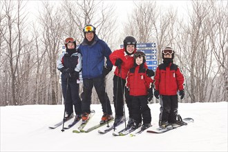 Caucasian family on ski slope