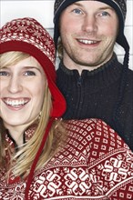 Caucasian couple wearing winter hats