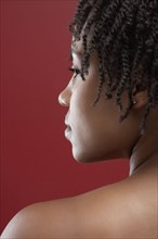 Black woman looking over her shoulder