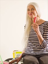 Caucasian woman enjoying popsicle