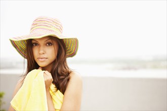 Hispanic woman enjoying the beach