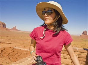 Asian woman in desert