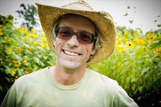 Caucasian farmer smiling outdoors