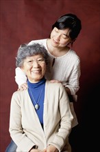 Japanese mother and daughter smiling