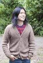 Japanese man standing outdoors