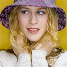 Smiling woman wearing sun hat