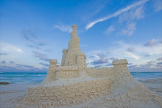 Elaborate sand castle on beach