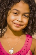 Close up of smiling Hispanic girl