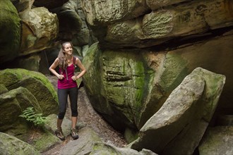 Caucasian woman exploring cave