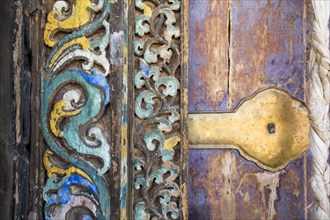 Close up of ornate carved door