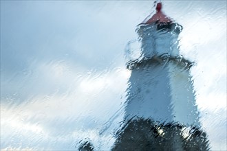 Laukvika Lighthouse viewed through rainy window