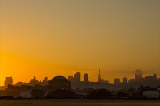 Silhouette of San Francisco city skyline at sunrise