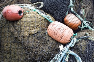 Close up of fishing net and buoys
