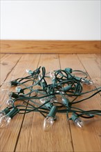 Christmas lights tangled on floor