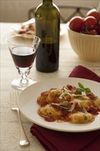Ravioli in tomato sauce and red wine