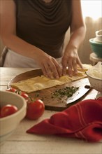 Woman preparing homemade ravioli