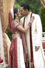 Indian couple in traditional wedding clothing