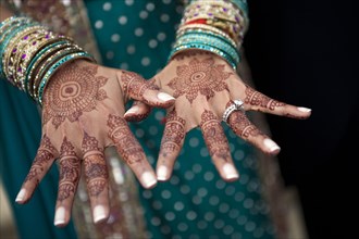 Close up of henna on Indian woman's hands