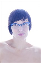 Portrait of quirky woman in eyeglasses