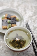 Close up of Japanese Genmai Cha tea and puffed rice