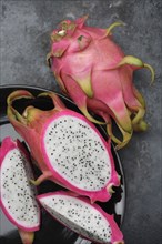 Whole and sliced dragon fruit