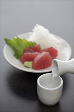 Tuna sashimi and sake