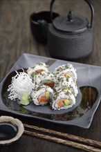 Sushi rolls and tea