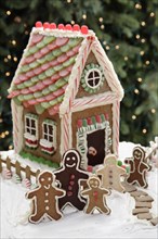 Gingerbread men cookies and gingerbread house
