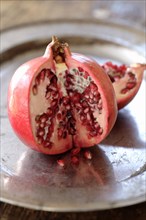 Cut open pomegranate