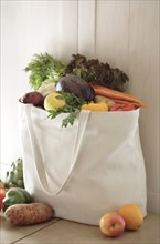 Variety of vegetables in reusable bag