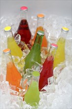 Soda bottles in ice