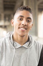 Portrait of smiling Mixed Race man