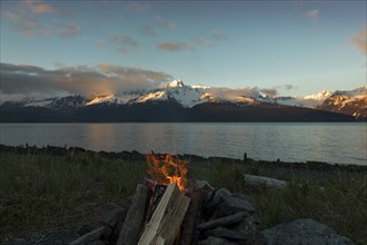 Campfire near mountain river