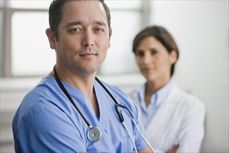 Smiling doctors standing together