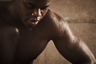 African American man sweating after exercise
