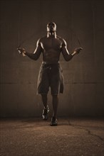 African American man jumping rope