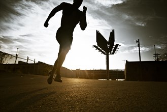 African American man jogging