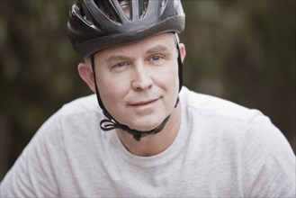 Caucasian man in bicycle helmet
