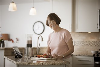 Asian woman preparing food