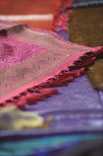 Close up of bright woven textiles