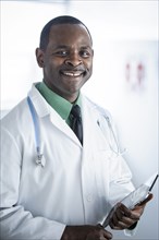African American doctor smiling in office